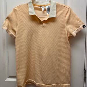 NWOT Adidas Women’s medium golf top.